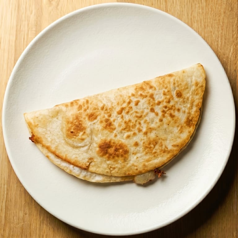 Indulge in Our Quesadilla